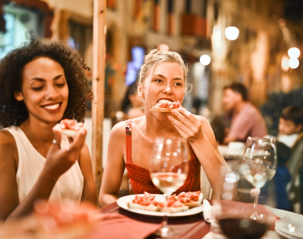 Woman eating bruschetta 1537635